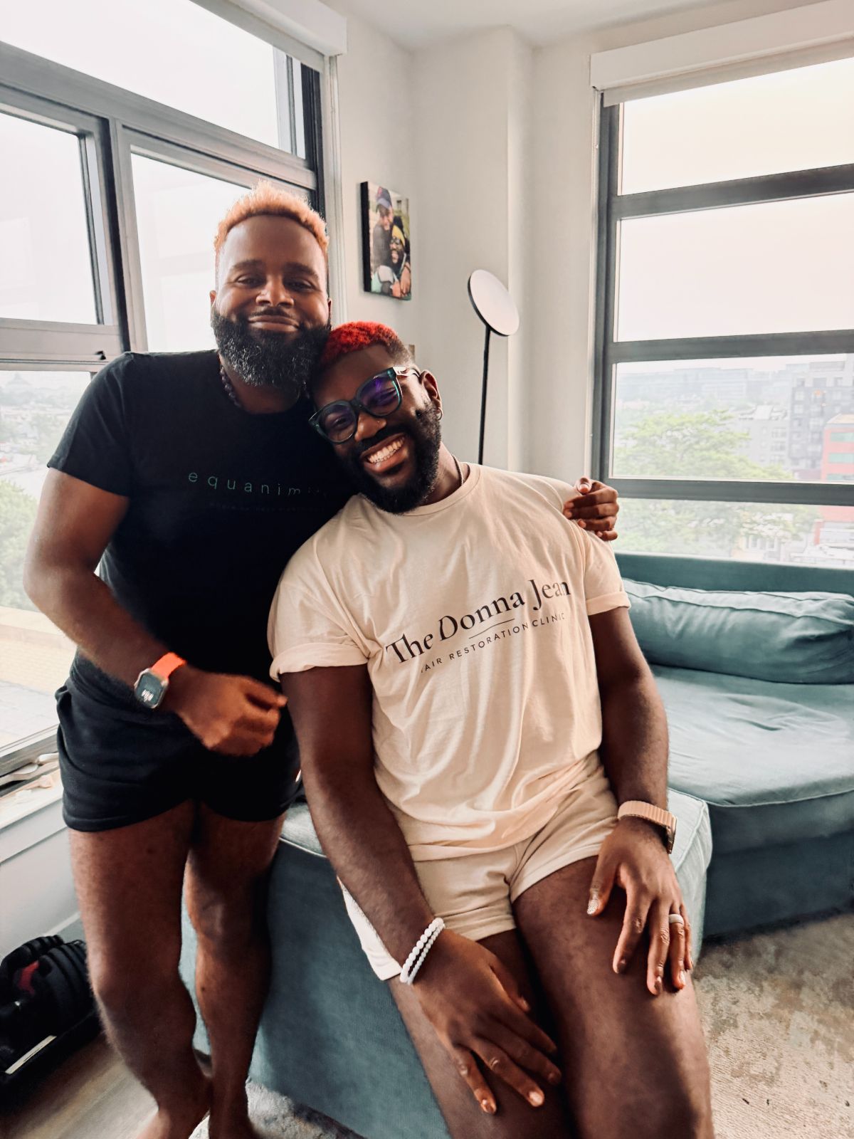 Victor and his husband Gary at home in Clinic and Equanimity shirts